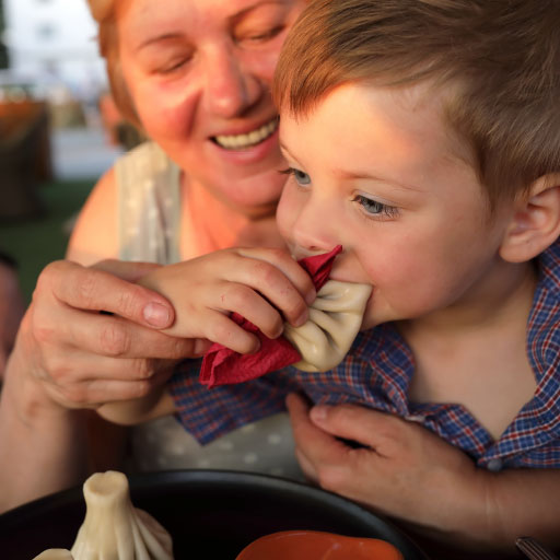 child eating momo